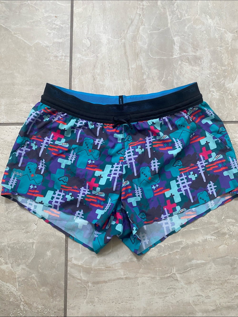 Janji Women’s Athletic Shorts in Teal, Purple, Black, Red Accent